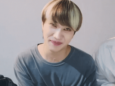 Close Up Of Person's Face In Gray Shirt GIF
