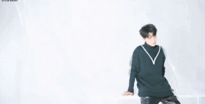 Close Up Of Person's Face In Sweater GIF