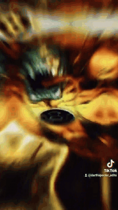 Close Up Of Person's Face With Blurred Painting Background GIF