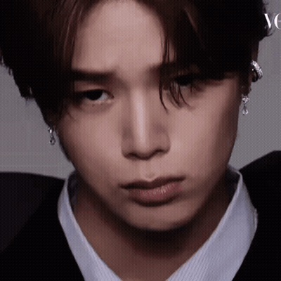 Close Up Of Person's Face With Earrings GIF