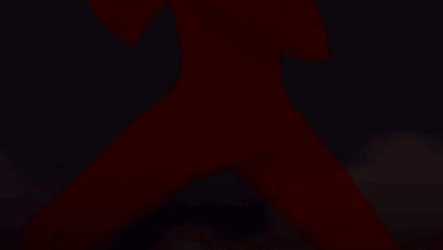 Close Up Of Person's Face With Glowing Orange Eyes GIF