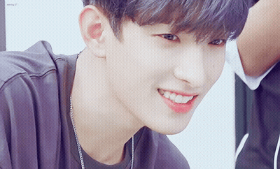 Close Up Of Person's Face With Necklace GIF