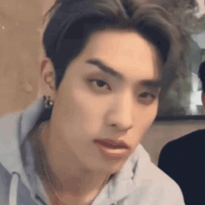 Close Up Of Person's Face With Necklace GIF