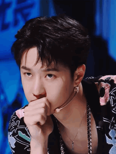 Close Up Of Person's Face With Necklace GIF