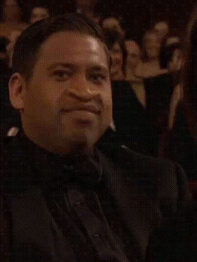 Close Up Of Person's Face With Olympic Rings GIF