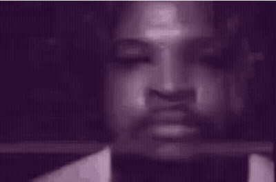 Close Up Of Person's Face With Purple Background GIF