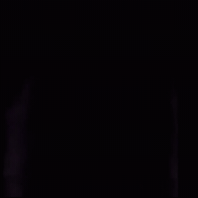 Close Up Of Person's Face With Red Eyes GIF