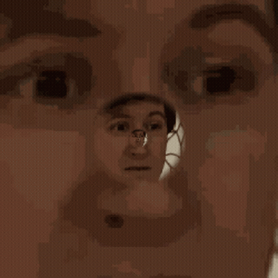 Close Up Of Person's Face With Reflection GIF