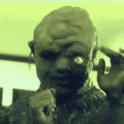 Close-Up Of Person's Face With Very Large Head GIF