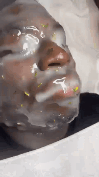 Close Up Of Person's Face Wrapped In Plastic GIF