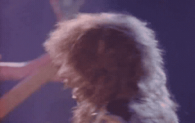 Close Up of Person's Hair on Purple Background
