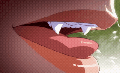Close Up Of Person's Mouth With Long Teeth GIF