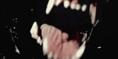 Close Up Of Person's Mouth With Teeth GIF