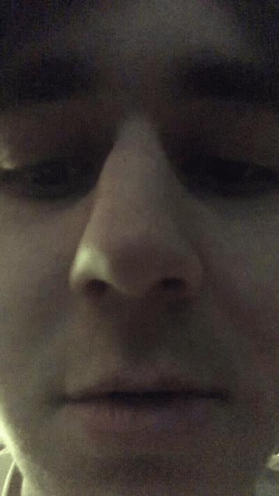 Close Up Of Person's Serious Face GIF