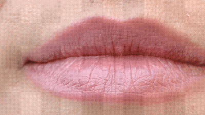 Close Up Of Person's Teeth And Pink Lip GIF