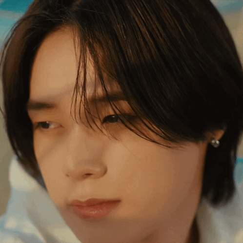 Close Up Of Person Wearing Earrings GIF