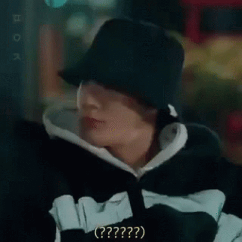 Close Up Of Person Wearing Hat And Hoodie Making Funny Face GIF