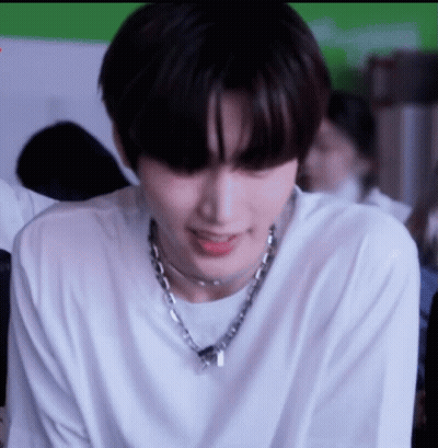 Close Up Of Person Wearing Necklace GIF