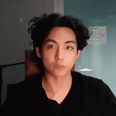 Close Up Of Person With Curly Hair GIF