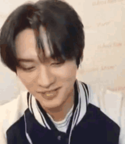 Close Up Of Person With Eyes Closed And Jacket GIF
