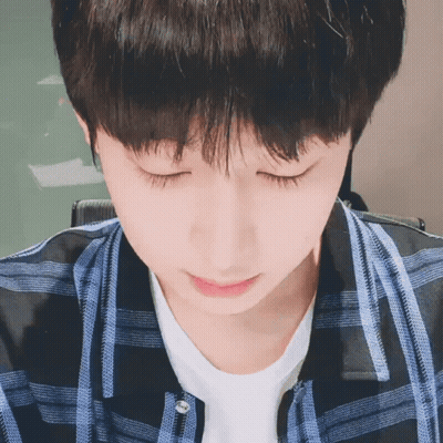 Close Up Of Person With Eyes Closed Plaid Shirt GIF