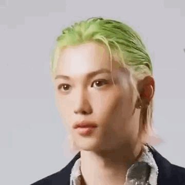 Close Up Of Person With Green Hair Wearing Suit GIF