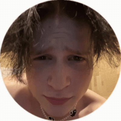 Close Up Of Person With Necklace GIF