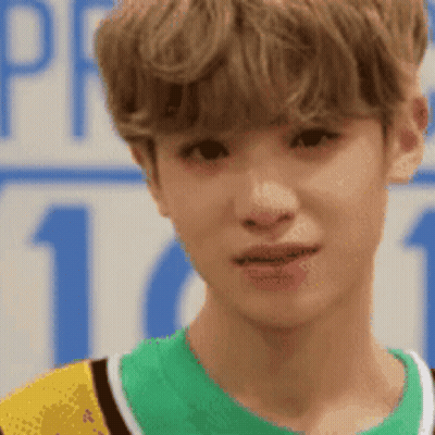 Close Up Of Person With Pr 101 Sign GIF