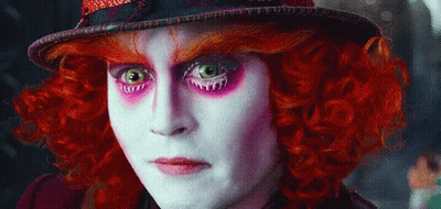 Close Up Of Person With Red Hair And Hat GIF