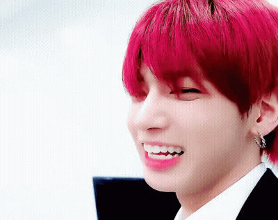 Close-Up Of Person With Red Hair And Teeth GIF