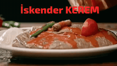 Close Up Of Plate Of Food With Iskender Kerem GIF