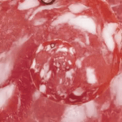 Close Up Of Red Liquid With Bubbles GIF