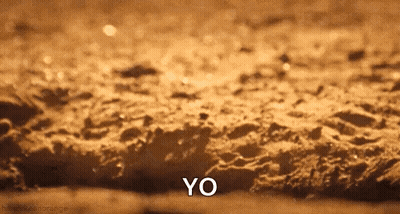 Close Up Of Sandy Surface Saying Yo GIF