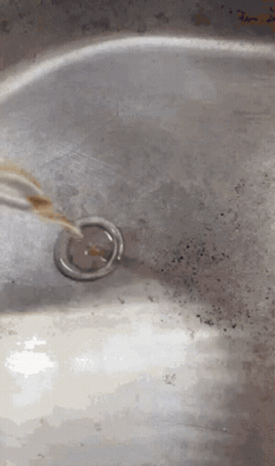Close Up Of Sink With Drain And Faucet GIF