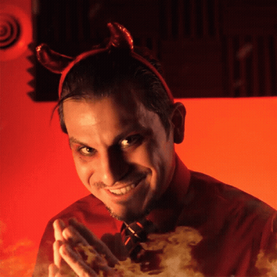 Close Up Of Smirking Man's Face GIF