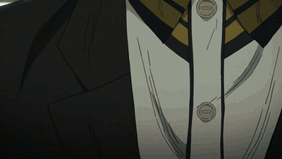 Close Up Of Suit And Tie With Letter O Buttons GIF