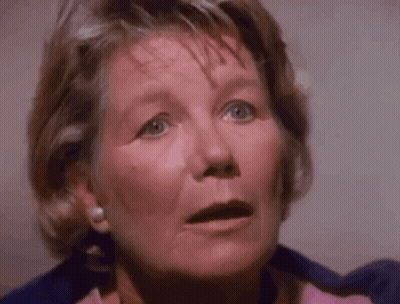 Close-Up Of Surprised Woman's Face GIF