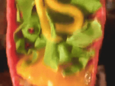 Close Up Of Taco With Lettuce And Cheese GIF