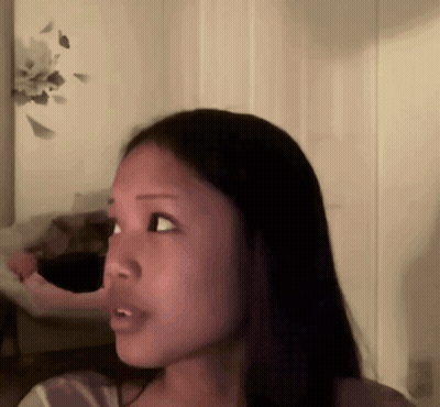 Close Up Of Woman Face In Room GIF