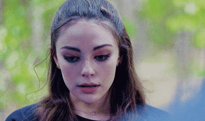 Close Up Of Woman Face With Blue Background GIF