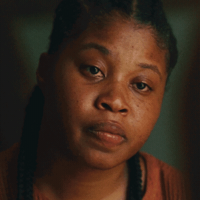 Close Up Of Woman Face With Braids GIF