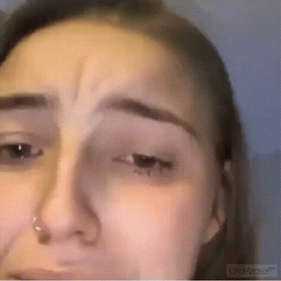 Close Up Of Woman Face With Crop Video Watermark GIF