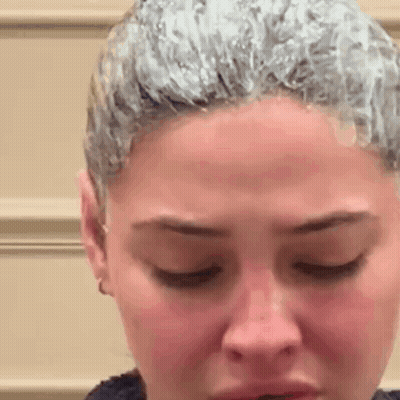 Close Up Of Woman Face With Hair Dye GIF