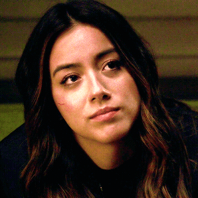 Close Up Of Woman In Black Shirt GIF