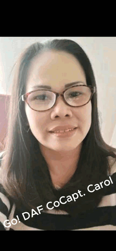 Close Up Of Woman In Glasses And Striped Shirt GIF