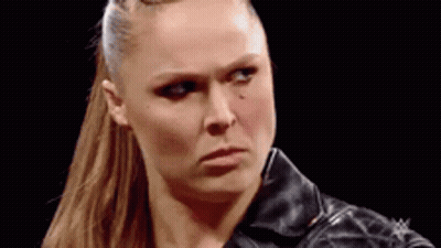 Close Up Of Woman In Leather Jacket And Ponytail GIF