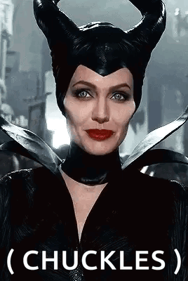 Close Up Of Woman In Maleficent Costume With Horns And Word Chuckles GIF