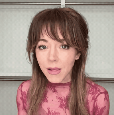 Close Up Of Woman In Pink Top GIF
