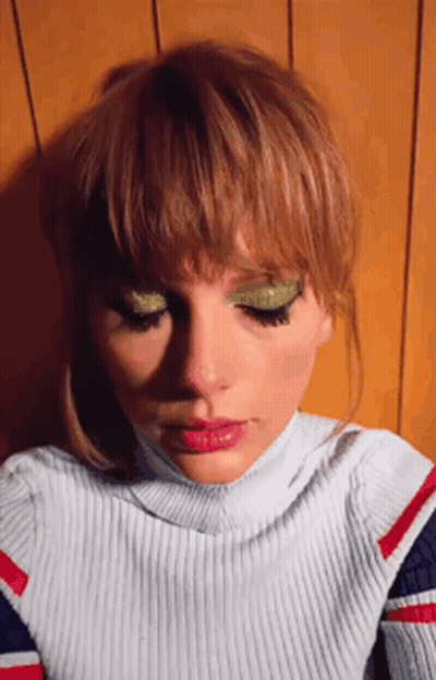 Close Up Of Woman In Striped Shirt GIF