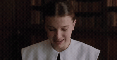 Close Up Of Woman In White Shirt And Collar GIF